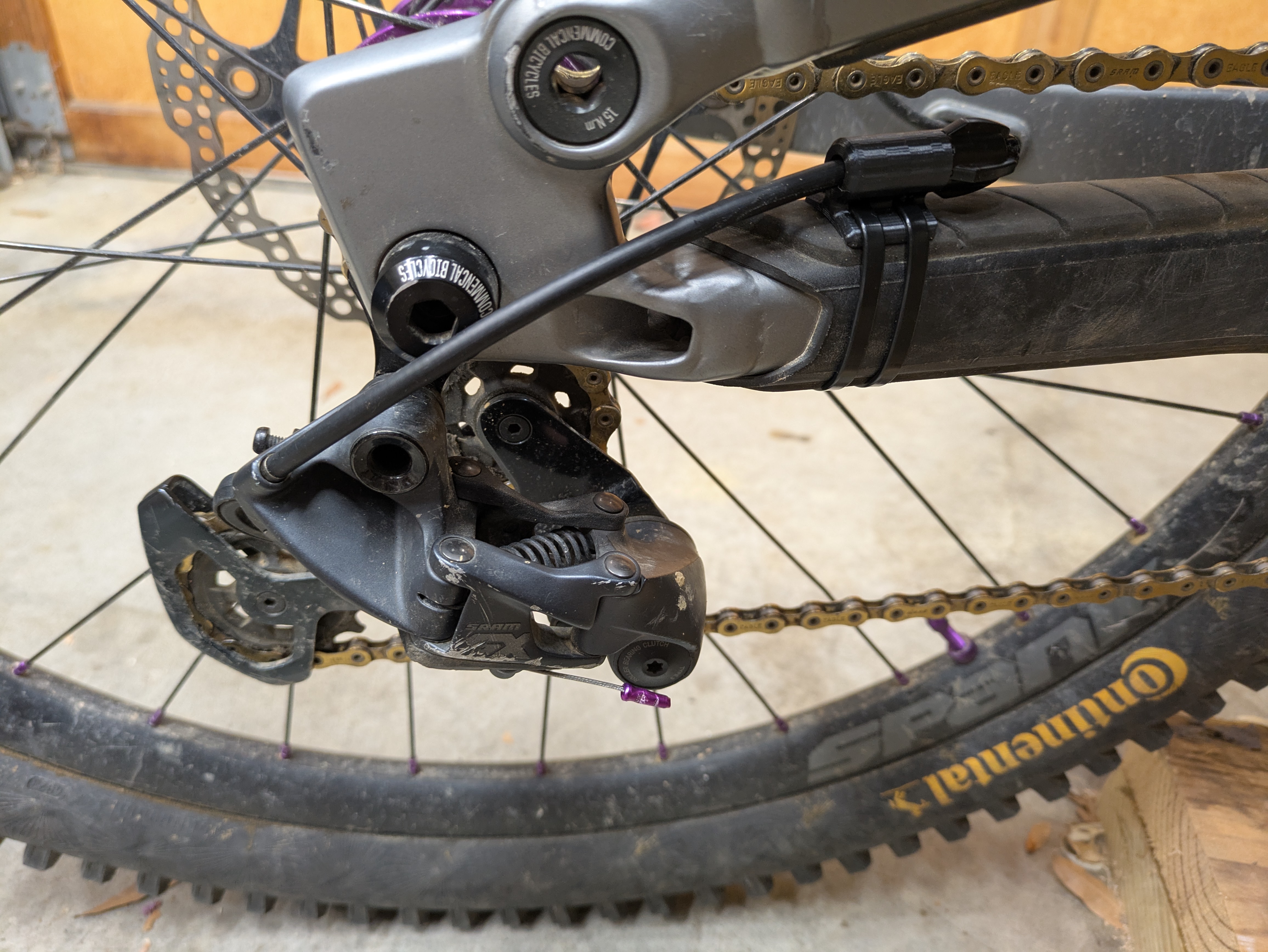 I tried a few different locations for this adjuster and finally decided the chainstay was the safest spot. On the seat stay, there was a good chance I would kick it with my heel or bash it with a rock while riding.