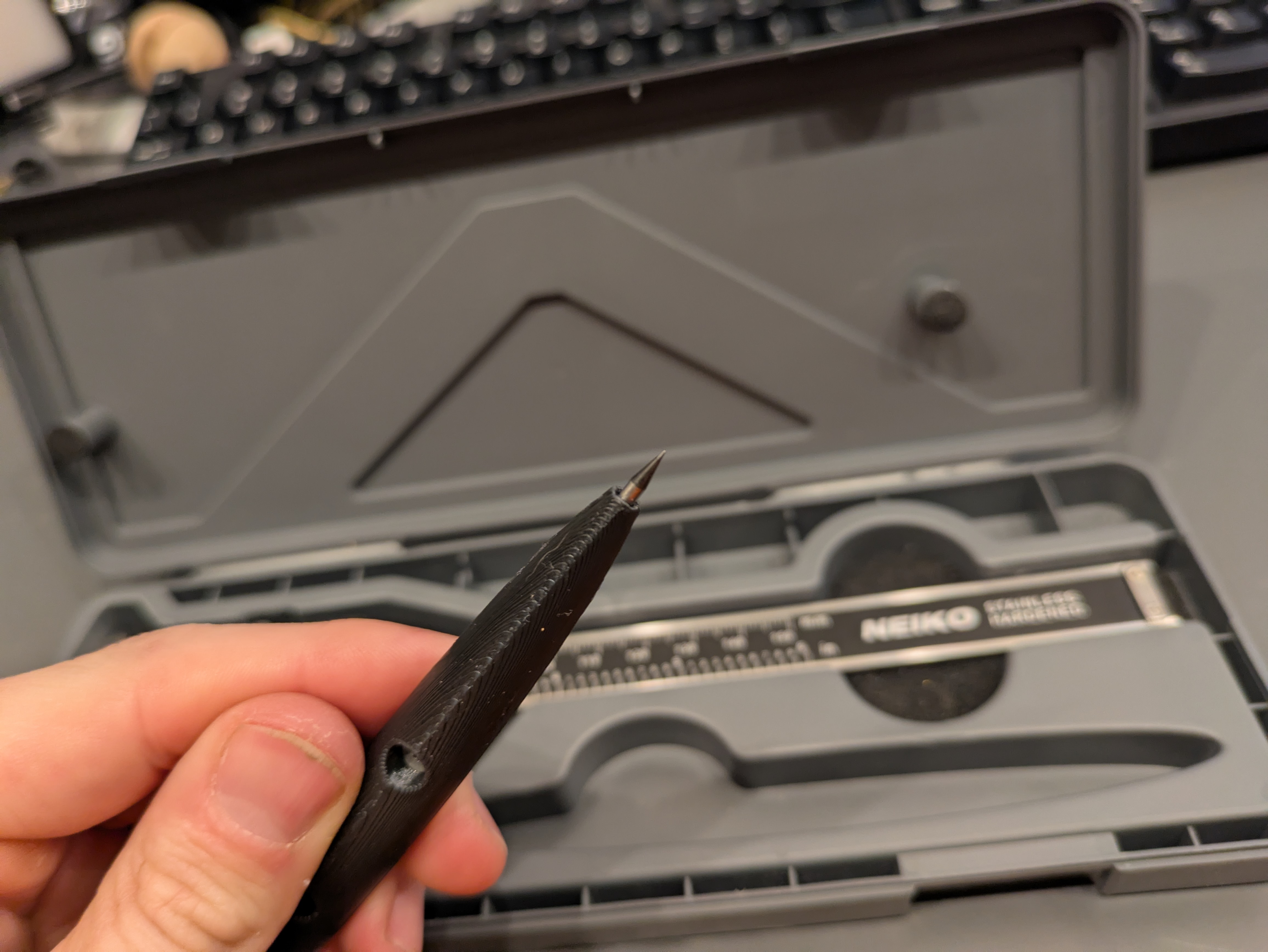 You can see my caliper case in the background, including the little spot for this pen.