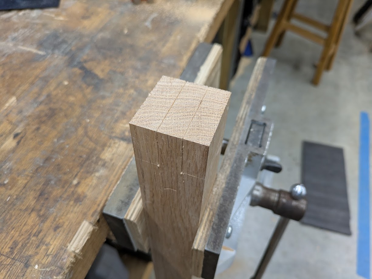 A tenon before being cut with guage lines.
