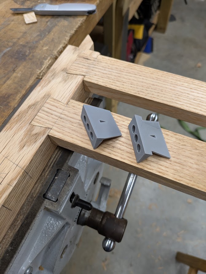 I printed these dovetail guides for this project. The little triangles in the middle are for alignment.