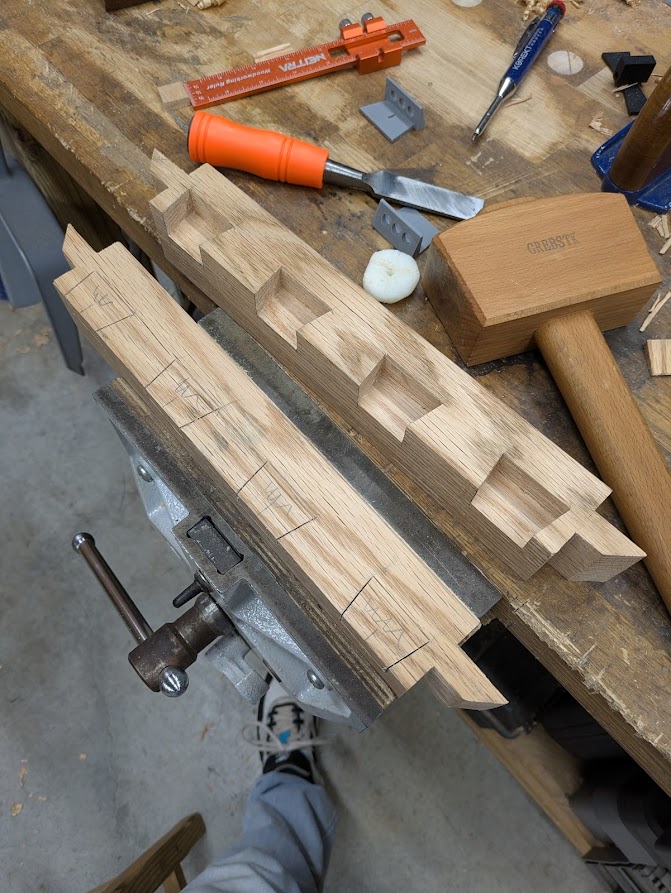 I cut the sockets on the stretchers first because they were going to be impossible to cut once the table was glued. I’ll wait on the slats.