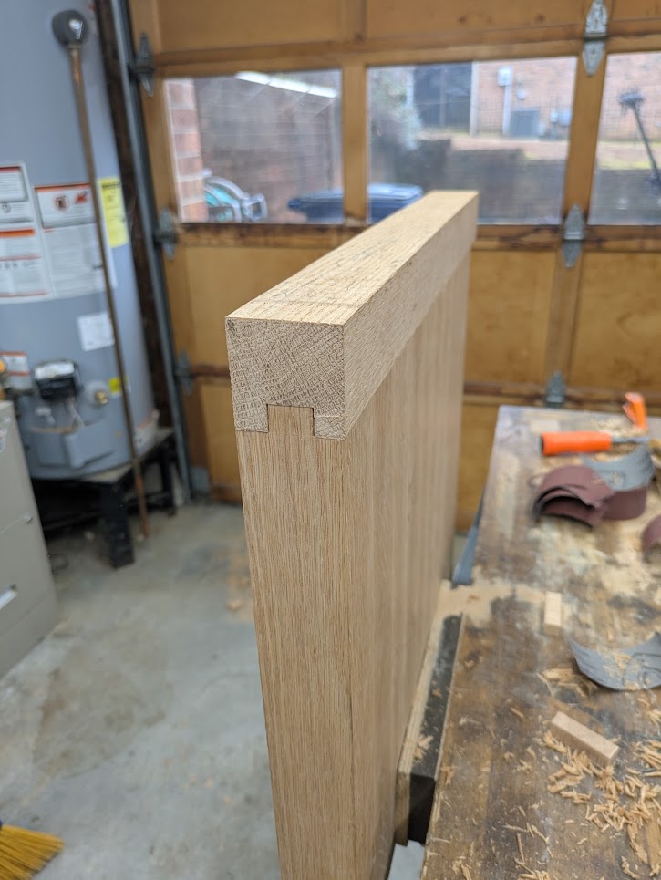 Another angle of the table top in my vise after the glue dried