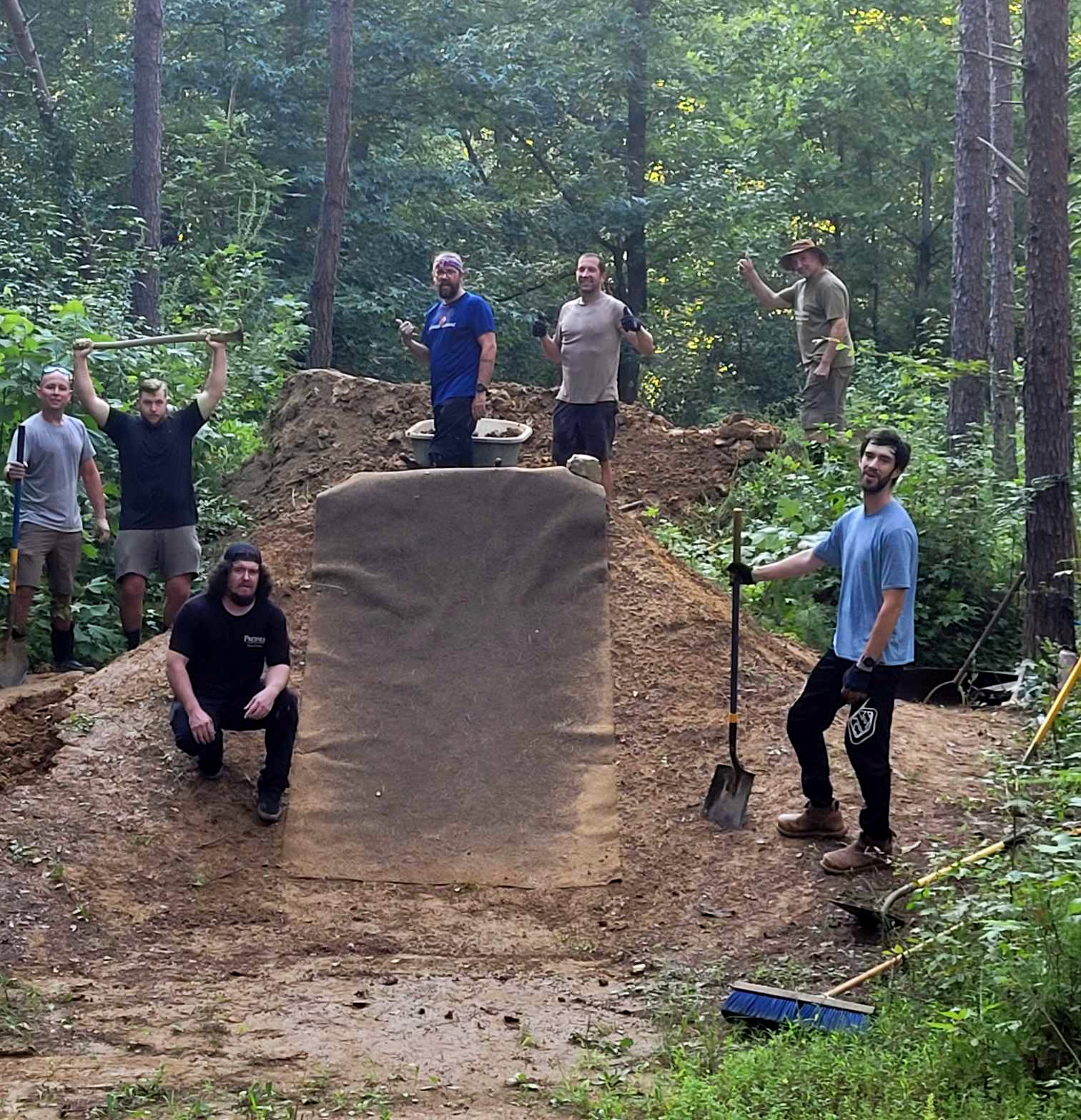 Left to right: Jairo, Hunter, Alan, JD, Caleb, Larry, and Eric putting some finishing touches on Main.